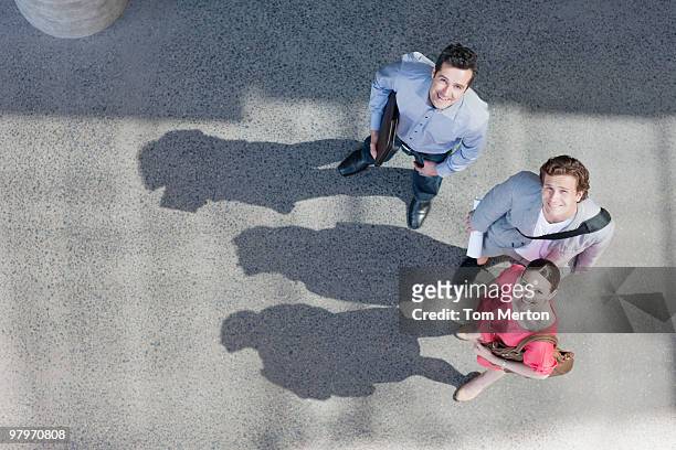 business people from directly above - 3 men looking up stock pictures, royalty-free photos & images