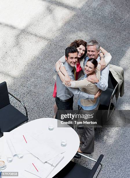 business people hugging - sydney from above stock pictures, royalty-free photos & images