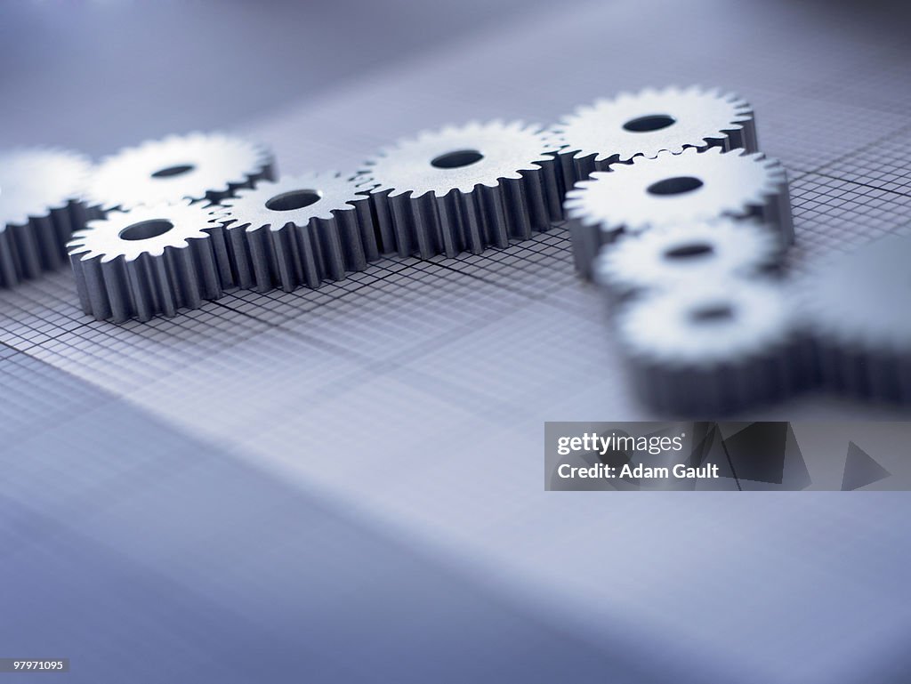 Close Up Of Cogs Forming Graph High-Res Stock Photo - Getty Images