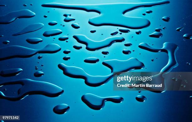 water on surface - puddles stock pictures, royalty-free photos & images