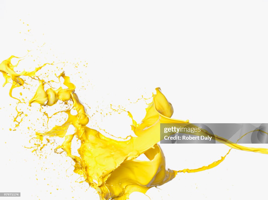 Yellow paint splashing