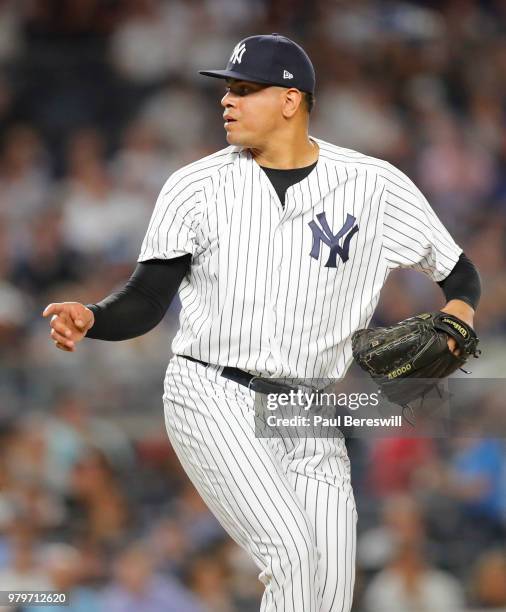 Pitcher Dellin Betances of the New York Yankees reacts after throwing a pitch in relief in an MLB baseball game against the Tampa Bay Rays on June...