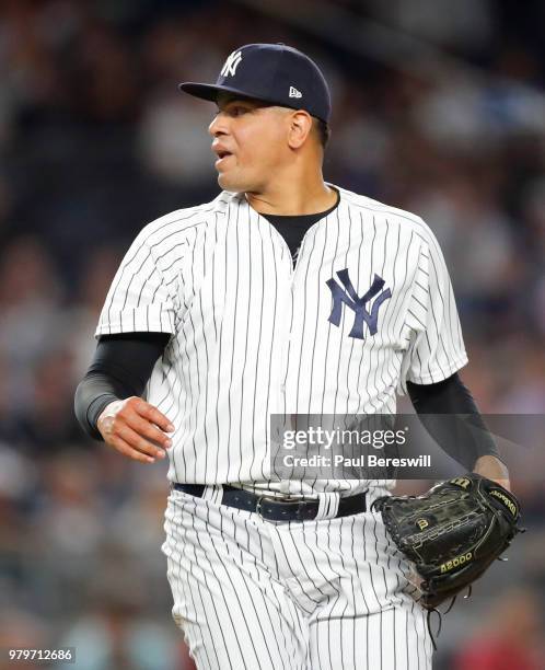 Pitcher Dellin Betances of the New York Yankees reacts after throwing a pitch in relief in an MLB baseball game against the Tampa Bay Rays on June...