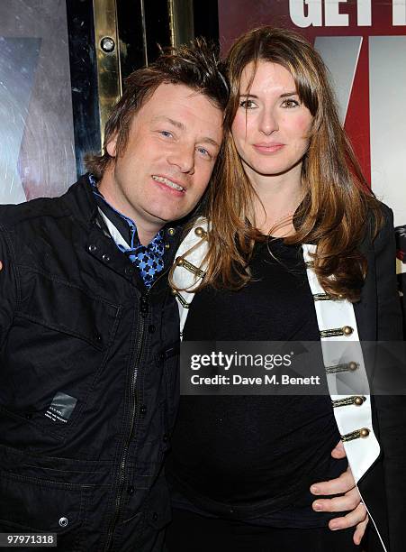 Jamie Oliver and wife Jools Oliver attend the premiere of "Kick Ass" at Empire Leicester Square on March 22, 2010 in London, England.