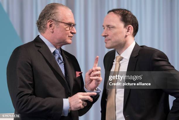 March 2018, Germany, Darmstadt: Chief executive Stefan Oschmann and chief financial officer Marcus Kuhnert talking. The Merck boss will speak of the...