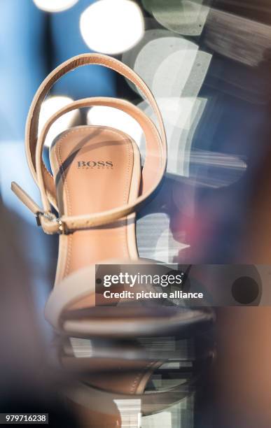 March 2018, Germany, Metzingen: A women#s shoe from the brand Hugo Boss presented during a annual balance sheet press conference for the year 2017....