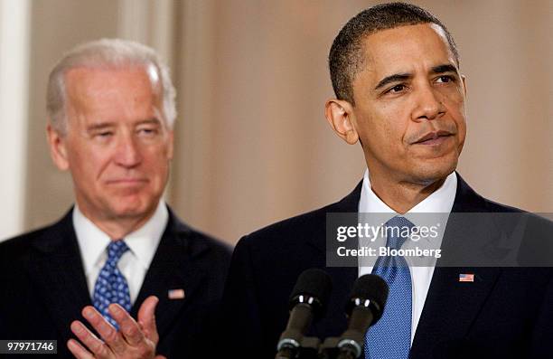 President Barack Obama, right, speaks during a news conference on the health insurance reform bill with U.S. Vice President Joseph Biden in the East...