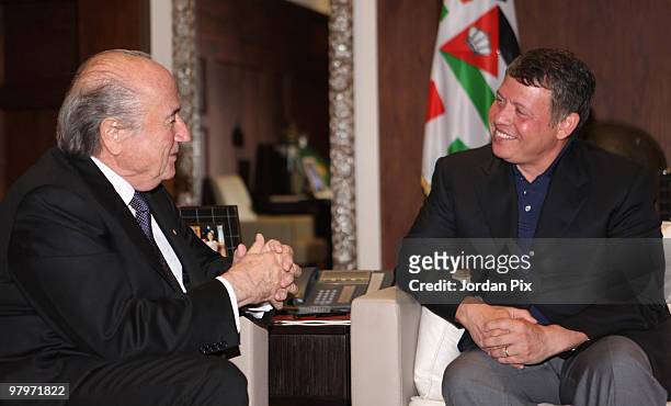 King Abdullah II of Jordan receives FIFA President Joseph S. Blatter at the Royal Palace on March 23, 2010 in Amman, Jordan. Blatter, who is on a...