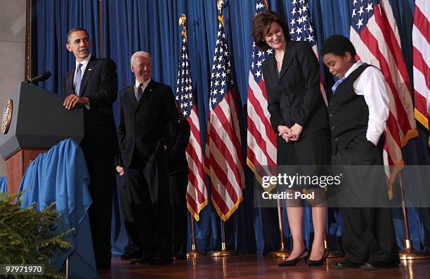 President Barack Obama compliments Marcelas Owens on his choice of the same blue tie that the President is wearing at a rally celebrating the final...