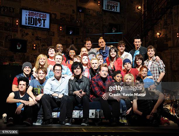 Director Michael Mayer, Billie Joe Armstrong, Mike Dirnt and Tre Cool of Green Day and the cast of "American Idiot" on stage during the "American...