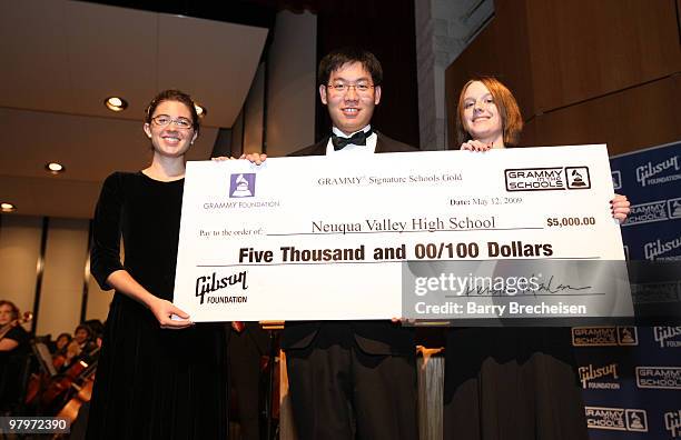 Amy Harwath, David Hahn and Kimberly Miller attend the GRAMMY Signature Schools Gold Award presentation concert at Neuqua Valley High School on May...