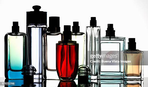 bottles of fragrances - borrifador de perfume imagens e fotografias de stock