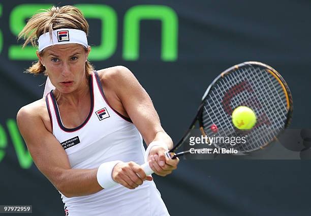 Polona Hercog of Slovakia plays a backhand against Barbora Zahlavova Strycova of the Ukraine during day one of the Sony Ericsson Open at Crandon Park...