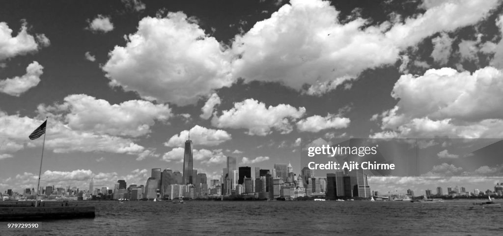 New York City under partly cloudy sky, New York, New York State, USA