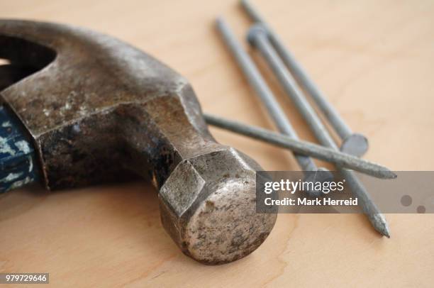 galvanized nails and a claw hammer - claw mark stock pictures, royalty-free photos & images