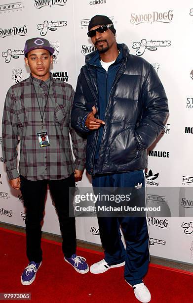 Rapper Snoop Dogg and son Spank arrive at the Los Angeles premiere of "Malice In Wonderland" at the Egyptian Theatre on March 22, 2010 in Hollywood,...