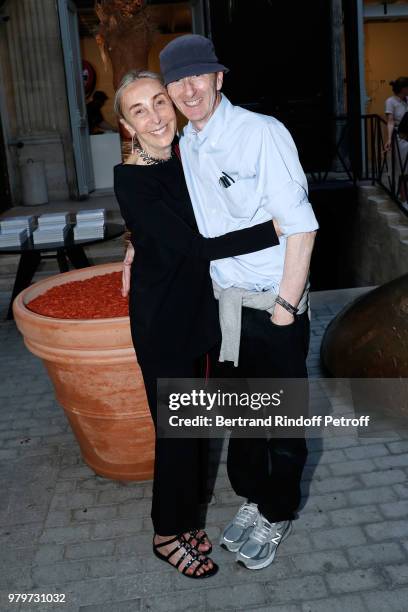 Carla Sozzani and Joe McKenna, realization of the book, attend photographer Bruce Weber signs the book "Azzedine, Bruce and Joe" at Galerie Azzedine...