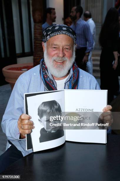 Photographer Bruce Weber signs the book "Azzedine, Bruce and Joe" at Galerie Azzedine Alaia on June 20, 2018 in Paris, France