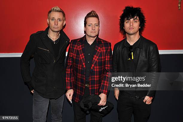 Musicians Mike Dirnt, Tre Cool and Billie Joe Armstrong of the band Green Day attend the cast of Broadway's "American Idiot" final sound check at St....