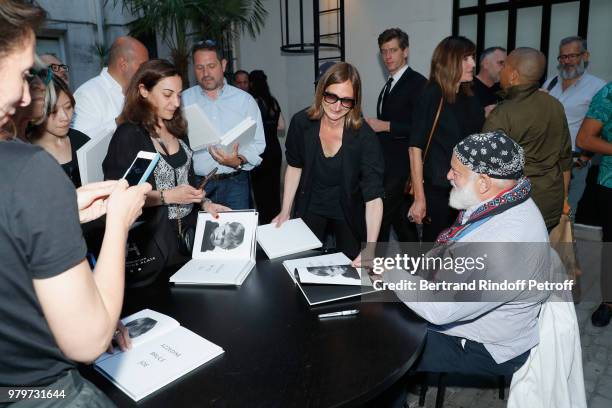 Photographer Bruce Weber signs the book "Azzedine, Bruce and Joe" at Galerie Azzedine Alaia on June 20, 2018 in Paris, France