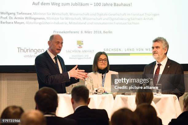 March 2018, Germany, Berlin: Wolfgang Tiefensee of the Social Democratic Party , Economics Minister of Thuringia, Barbara Meyer, head of the...