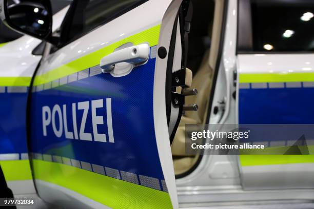 March 2018, Germany, Nuremberg: An armoured vehicle of the police is exhibited at the stand of the German company WELP Armouring at the "Enforce Tac"...