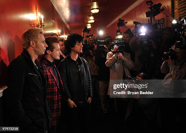 Musicians Mike Dirnt, Tre Cool and Billie Joe Armstrong of the band Green Day attend the cast of Broadway's "American Idiot" final sound check at St....