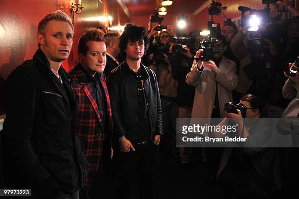 Musicians Mike Dirnt, Tre Cool and Billie Joe Armstrong of the band Green Day attend the cast of Broadway's "American Idiot" final sound check at St....