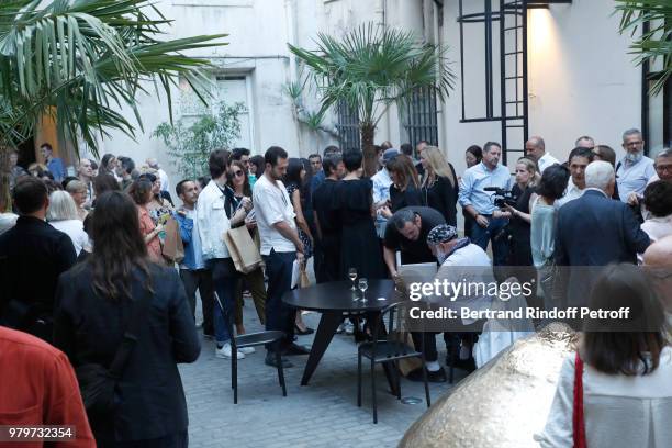 Photographer Bruce Weber signs the book "Azzedine, Bruce and Joe" at Galerie Azzedine Alaia on June 20, 2018 in Paris, France