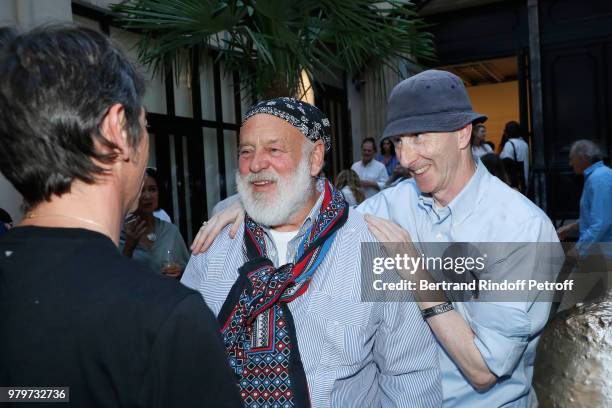 Stylist Pierpaolo Piccioli, Bruce Weber, photographs of the book, and Joe McKenna, realization of the book, attend photographer Bruce Weber signs the...