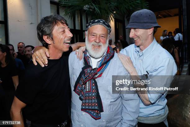 Stylist Pierpaolo Piccioli, Bruce Weber, photographs of the book, and Joe McKenna, realization of the book, attend photographer Bruce Weber signs the...
