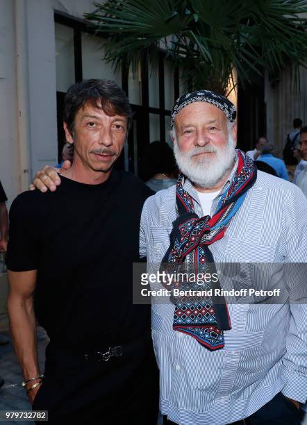 Stylist Pierpaolo Piccioli and Bruce Weber attend photographer Bruce Weber signs the book "Azzedine, Bruce and Joe" at Galerie Azzedine Alaia on June...