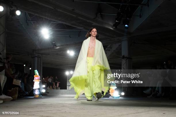 Model walks the runway during the Acne Studio Menswear Spring/Summer 2019 show as part of Paris Fashion Week on June 20, 2018 in Paris, France.