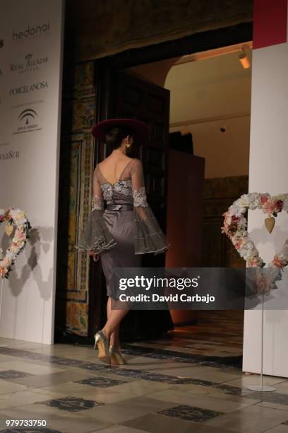 Model walks the runway wearing designs by Aurora Gavino of SQI Handcratf & Fashion 2018 on June 20, 2018 in Seville, Spain.