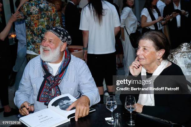 Bruce Weber and his wife attend photographer Bruce Weber signs the book "Azzedine, Bruce and Joe" at Galerie Azzedine Alaia on June 20, 2018 in...