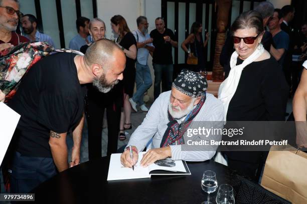 Bruce Weber and his wife attend photographer Bruce Weber signs the book "Azzedine, Bruce and Joe" at Galerie Azzedine Alaia on June 20, 2018 in...