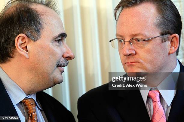 White House Senior Advisor David Axelrod talks to White House Press Secretary Robert Gibbs prior to the signing ceremony of the Affordable Health...