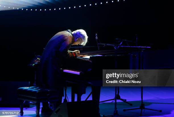 Ryuichi Sakamoto performs at Barbican Centre on June 20, 2018 in London, England.