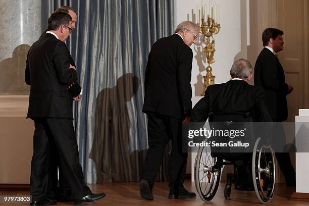 German Economy Minister Rainer Bruederle , Finance Minister Wolfgang Schaeuble and Interior Minister Thomas de Maiziere arrive for a dinner at...