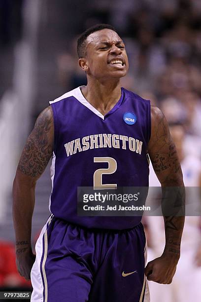 Guard Isaiah Thomas of the Washington Huskies reacts after a play against the New Mexico Lobos in the second round of the 2010 NCAA men's basketball...