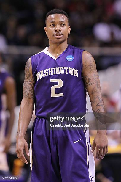 Guard Isaiah Thomas of the Washington Huskies reacts after a play against the New Mexico Lobos in the second round of the 2010 NCAA men's basketball...