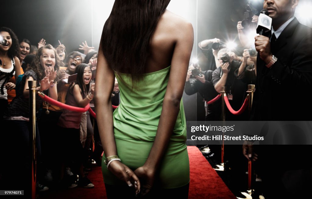 Mixed race celebrity at red carpet event