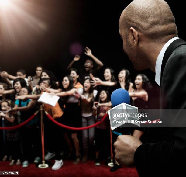 african broadcaster at red carpet event - autograph hunter stock pictures, royalty-free photos & images