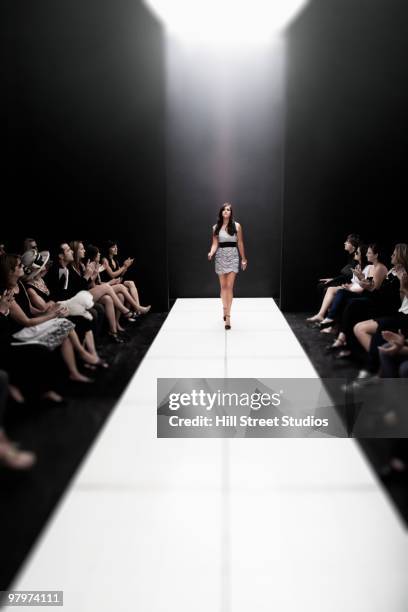 model on runway at fashion show - critic stock pictures, royalty-free photos & images