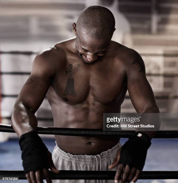 african boxer in boxing ring laughing - male chest stock pictures, royalty-free photos & images