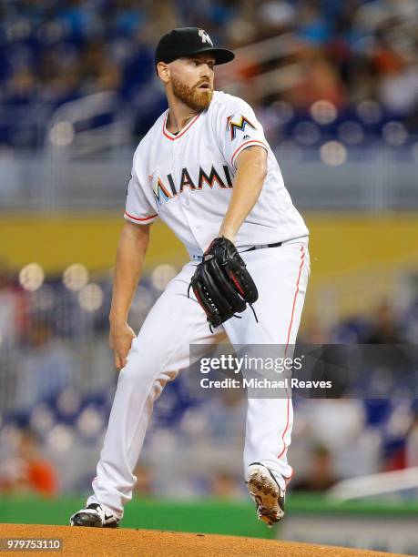 Dan Straily of the Miami Marlins delivers a pitch in the first inning against the San Francisco Giants at Marlins Park on June 14, 2018 in Miami,...