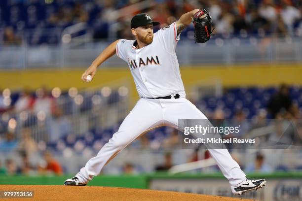 Dan Straily of the Miami Marlins delivers a pitch in the first inning against the San Francisco Giants at Marlins Park on June 14, 2018 in Miami,...