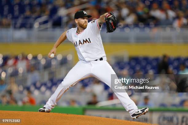 Dan Straily of the Miami Marlins delivers a pitch in the first inning against the San Francisco Giants at Marlins Park on June 14, 2018 in Miami,...