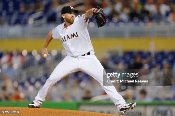 Dan Straily of the Miami Marlins delivers a pitch in the first inning against the San Francisco Giants at Marlins Park on June 14, 2018 in Miami,...