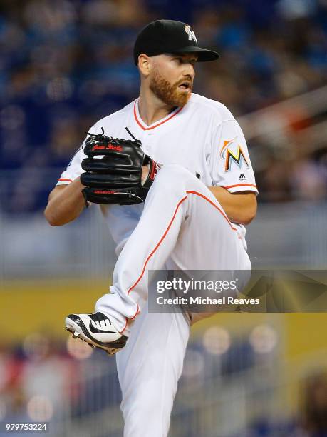 Dan Straily of the Miami Marlins delivers a pitch in the first inning against the San Francisco Giants at Marlins Park on June 14, 2018 in Miami,...